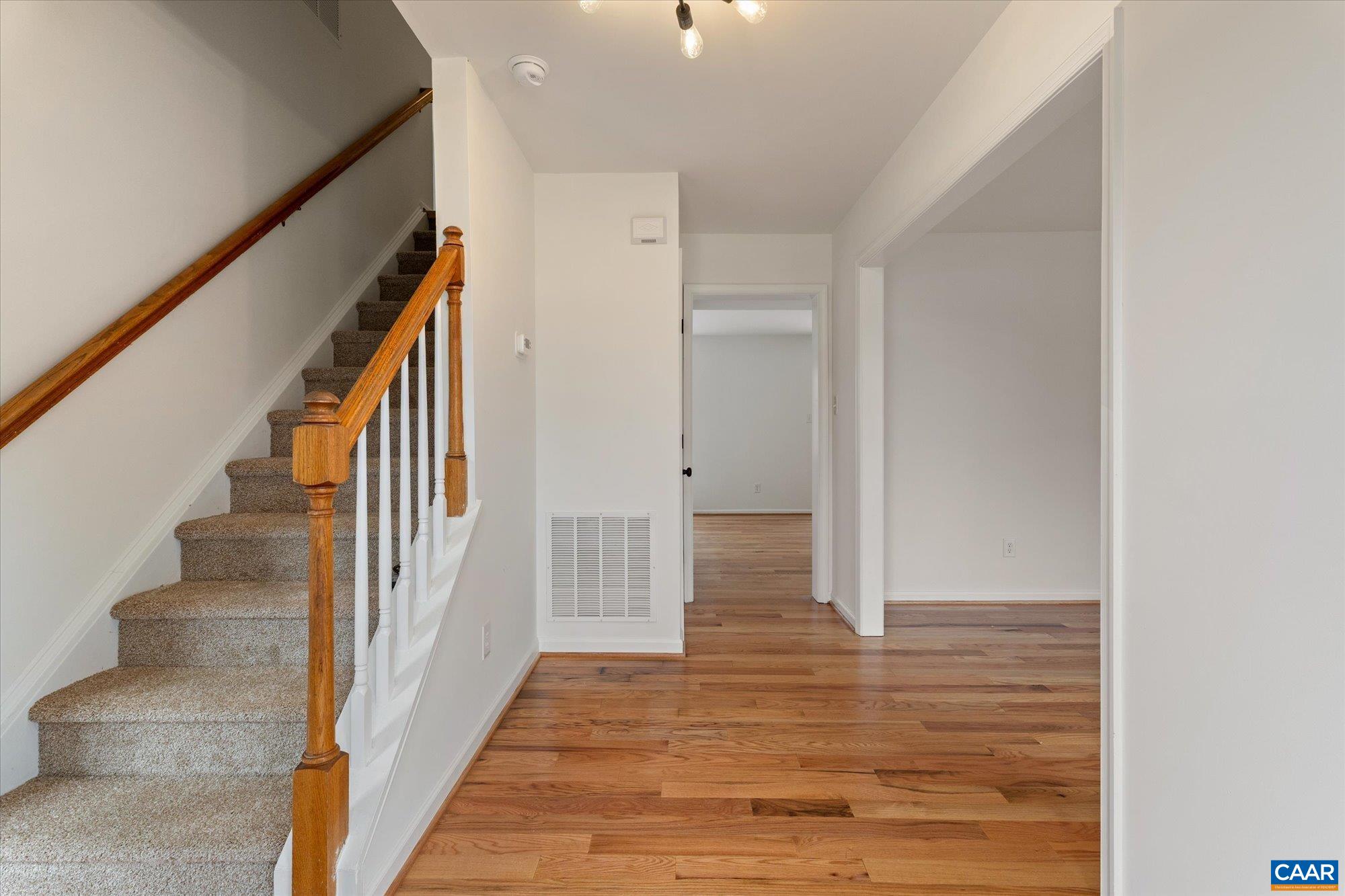 1600 Old Brook Road Charlottesville, VA 22901 - Photo 18 of 48 a view of an entryway with wooden floor