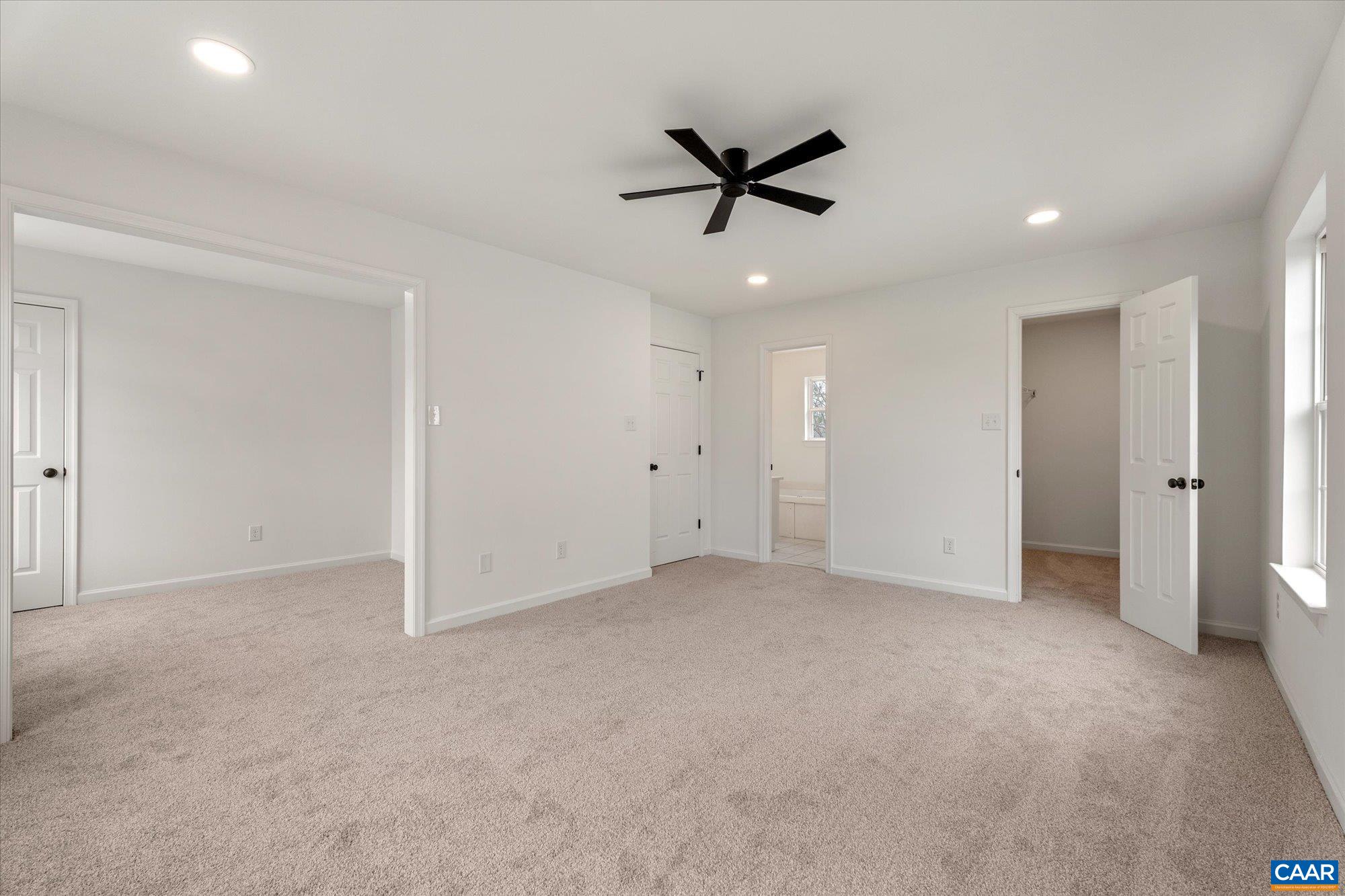 1600 Old Brook Road Charlottesville, VA 22901 - Photo 19 of 48 an empty room with closet and a ceiling fan