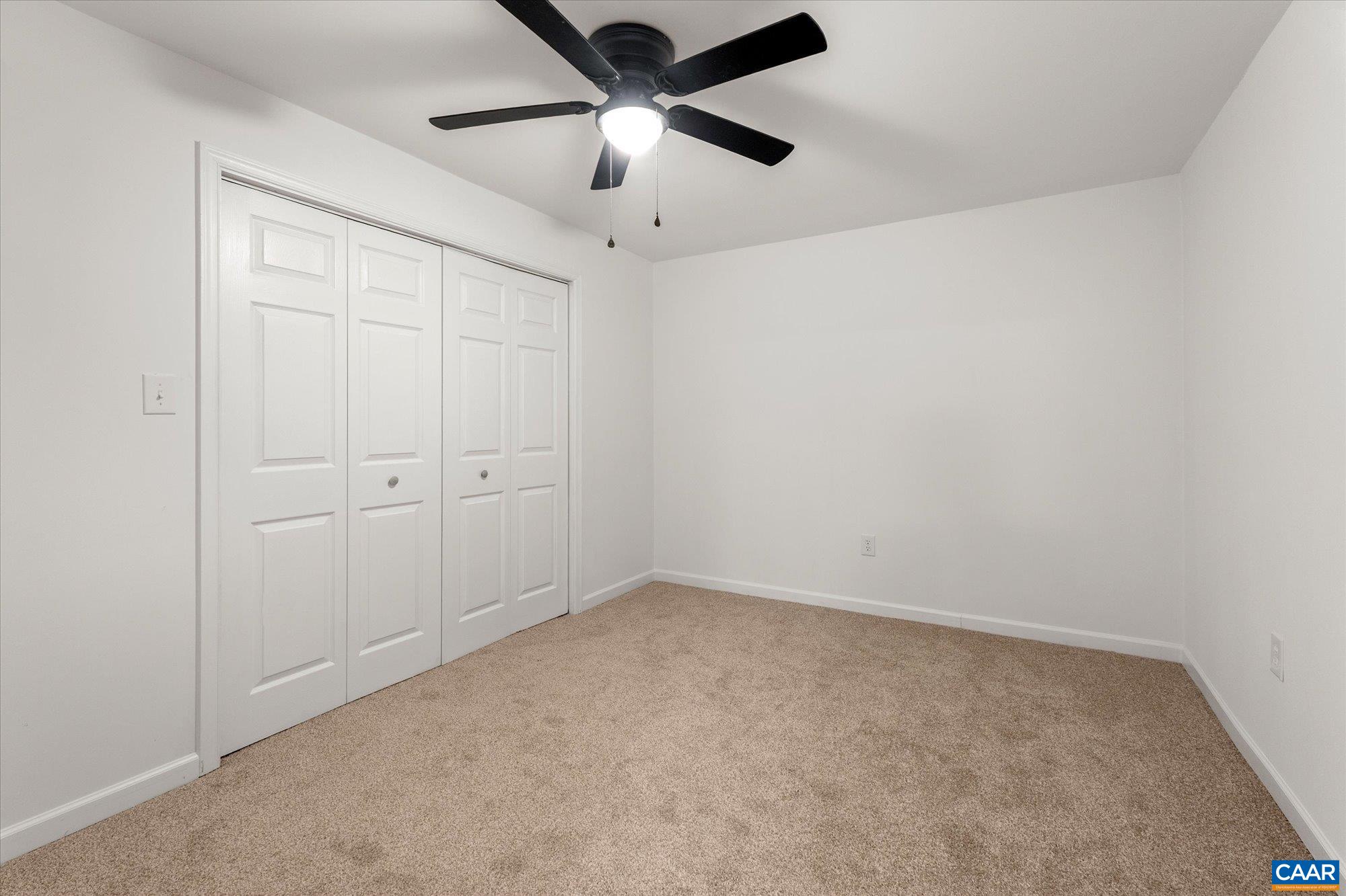 1600 Old Brook Road Charlottesville, VA 22901 - Photo 38 of 48 an empty room with chandelier fan
