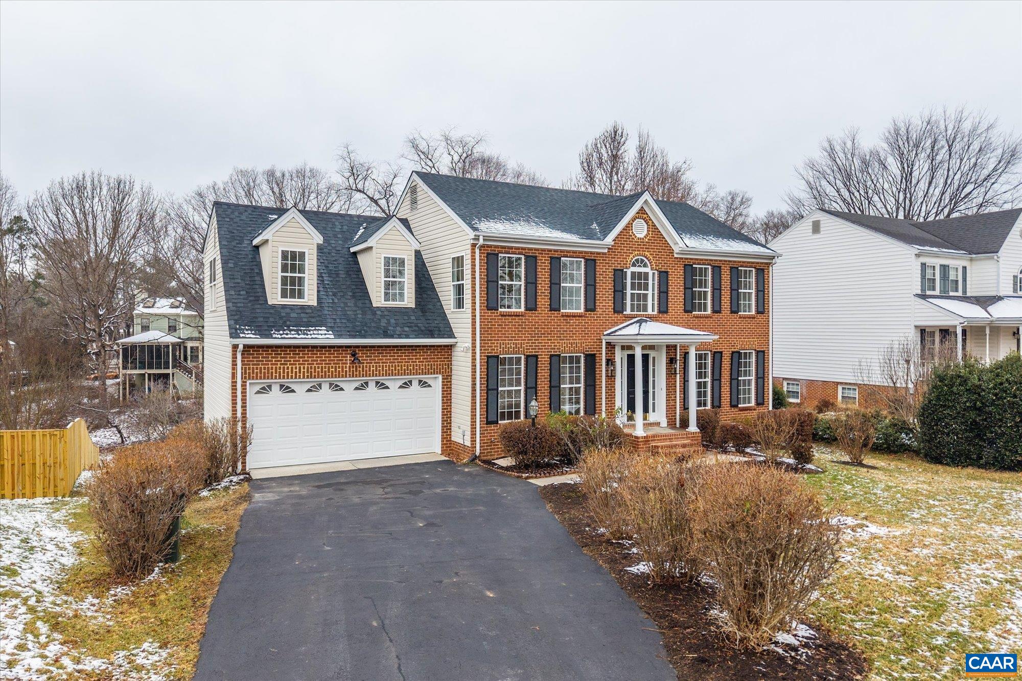 1600 Old Brook Road Charlottesville, VA 22901 - Photo 45 of 48 a front view of a house with a yard and garage