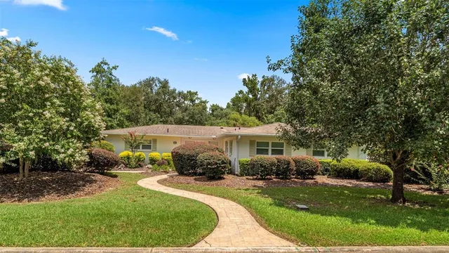a house view with a garden space