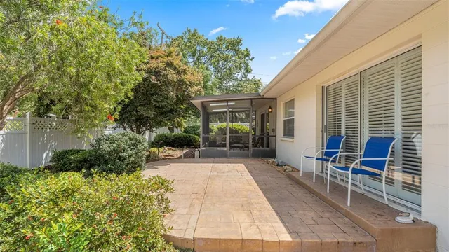 a view of backyard with green space