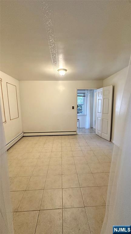 90 Clark Street Garfield, NJ 07026 - Photo 15 of 17 a view of an empty room and window