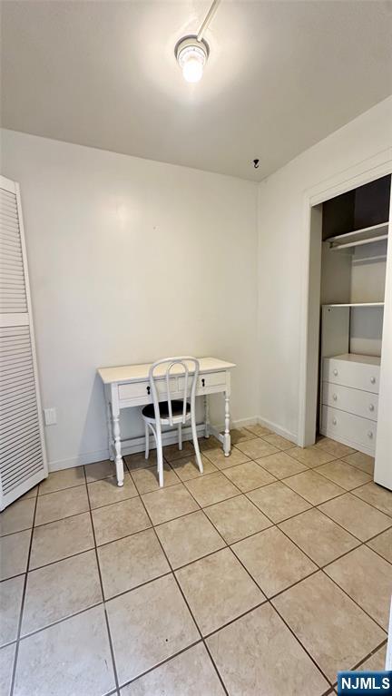 90 Clark Street Garfield, NJ 07026 - Photo 16 of 17 a view of a room with furniture and window