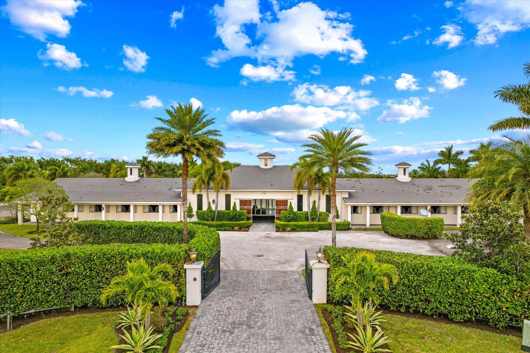 3794 Shutterfly Way Wellington, FL 33414 - Photo 2 of 92 002-126-DJI_0807-Edit