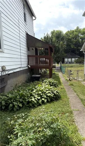 a view of a garden with a chair