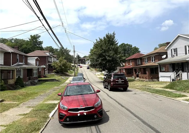 a car parked in front of a house