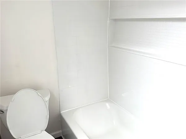 a close up of a toilet