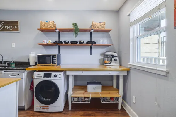 a utility room with dryer and washer