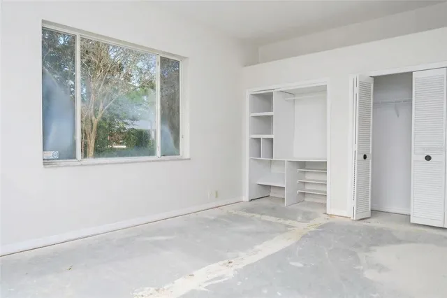 an empty room with window