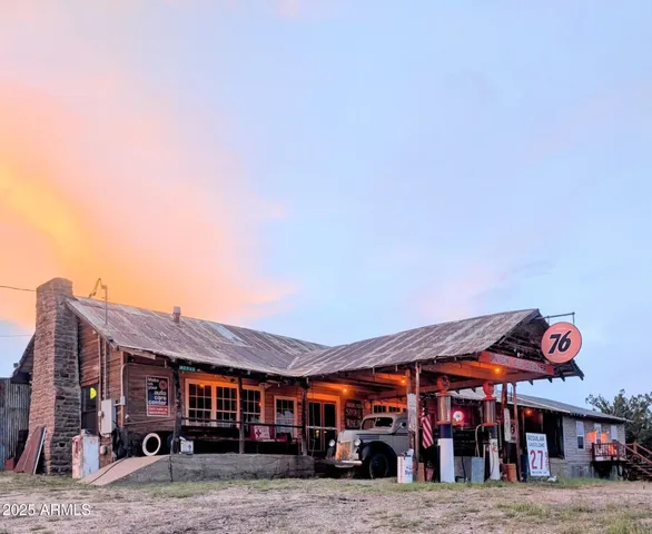 a view of a swimming pool with an outdoor seating