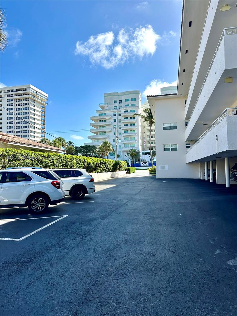 2501 South Ocean Boulevard, Unit 1040 Boca Raton, FL 33432 - Photo 5 of 16 a view of a car is parked in front of a building