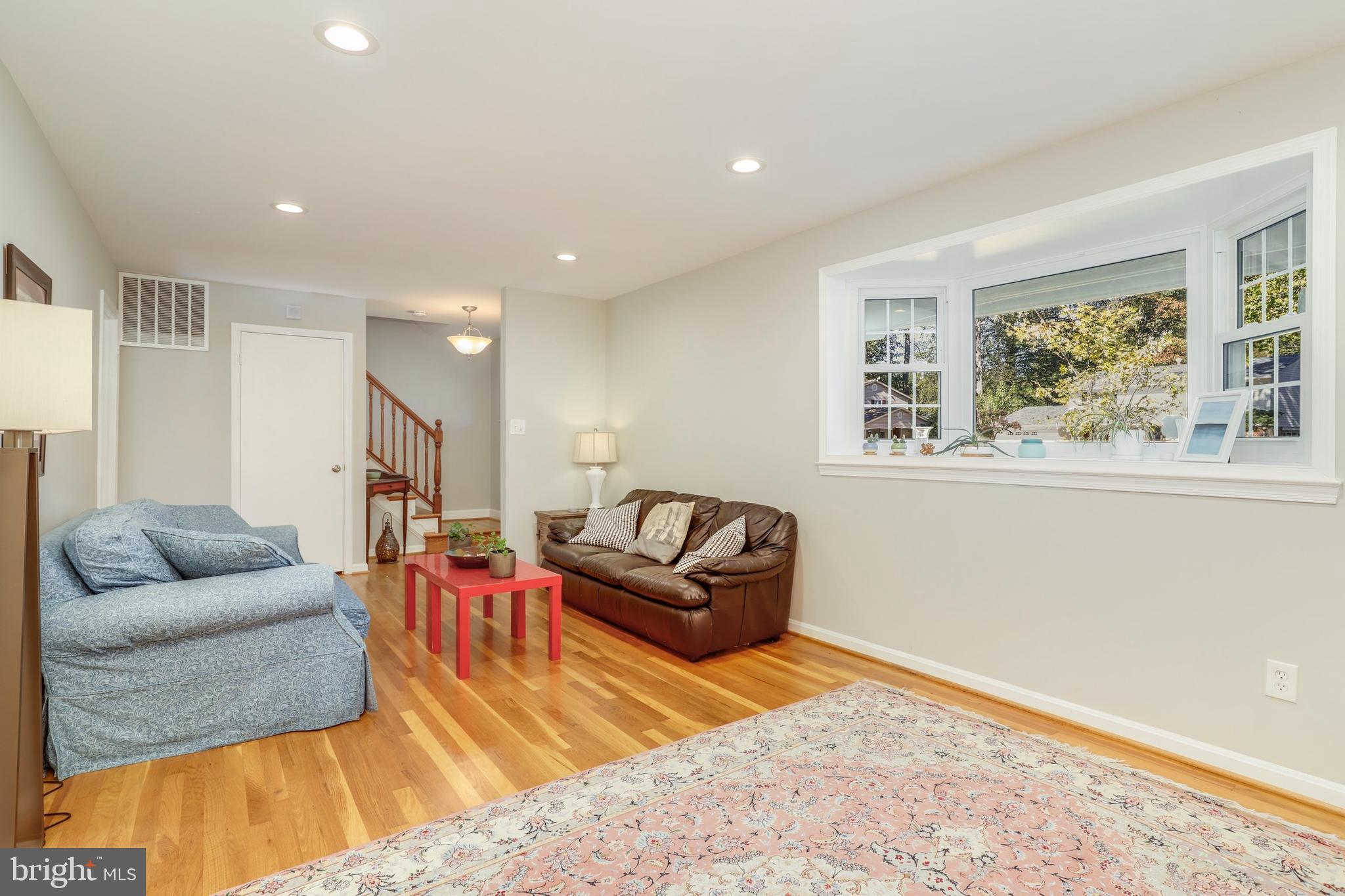 8461 Thames Street Springfield, VA 22151 - Photo 24 of 57 a living room with furniture and a large window