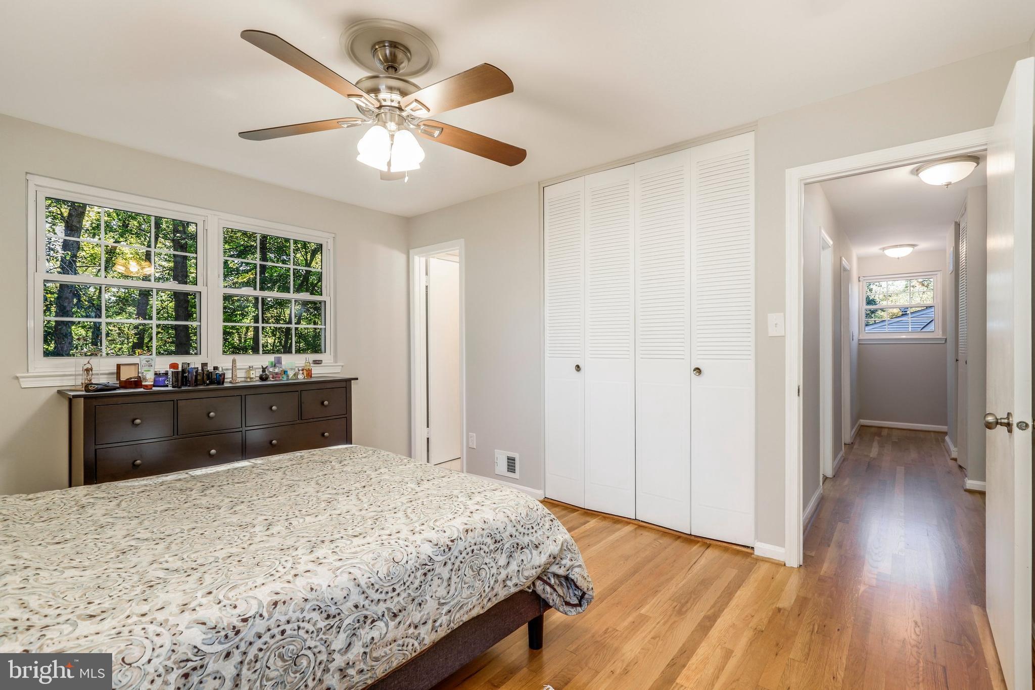 8461 Thames Street Springfield, VA 22151 - Photo 30 of 57 a bed room with a bed and a large window