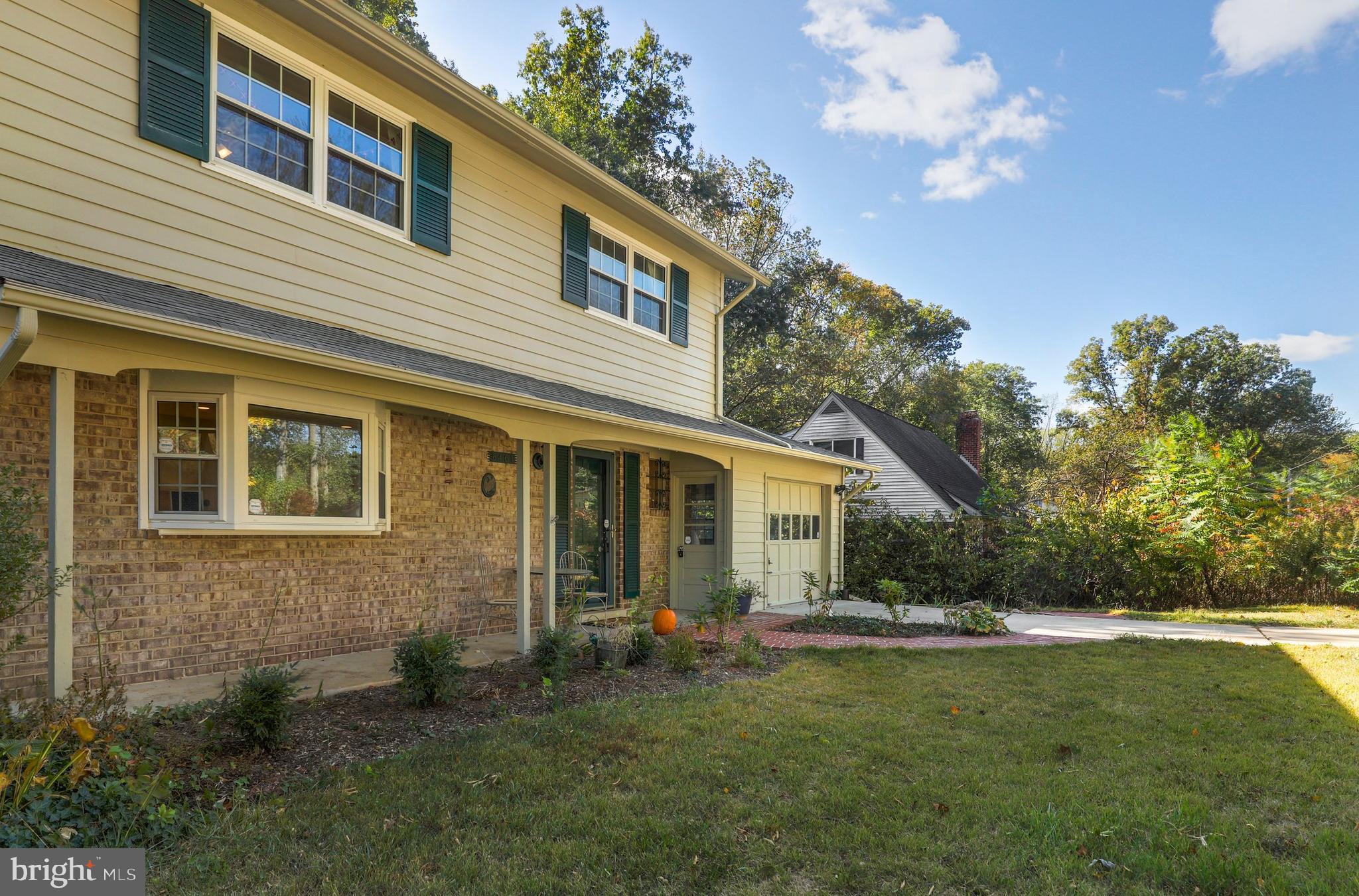 8461 Thames Street Springfield, VA 22151 - Photo 4 of 57 a view of a house with a backyard