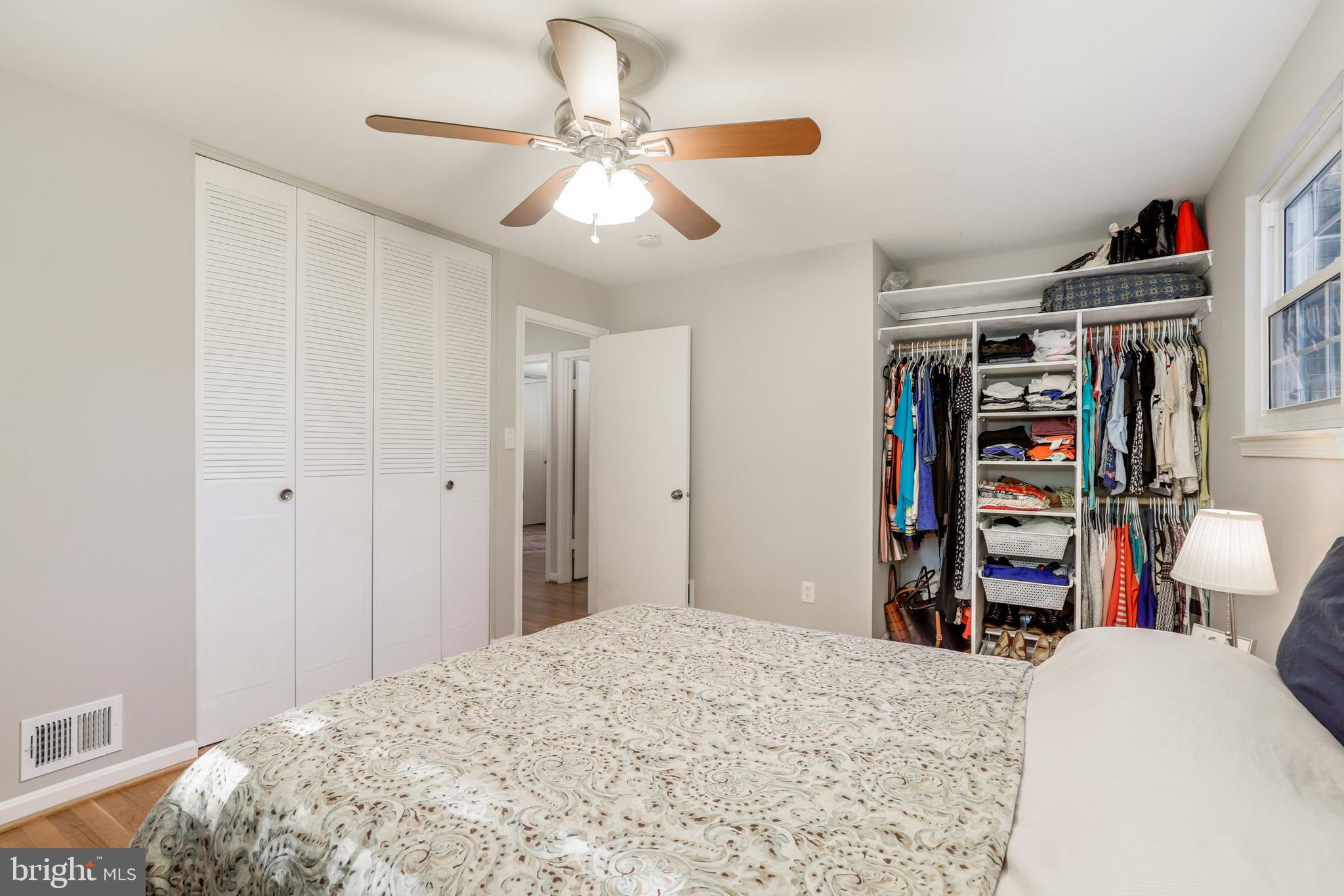 8461 Thames Street Springfield, VA 22151 - Photo 36 of 57 a bedroom with a bed and closet