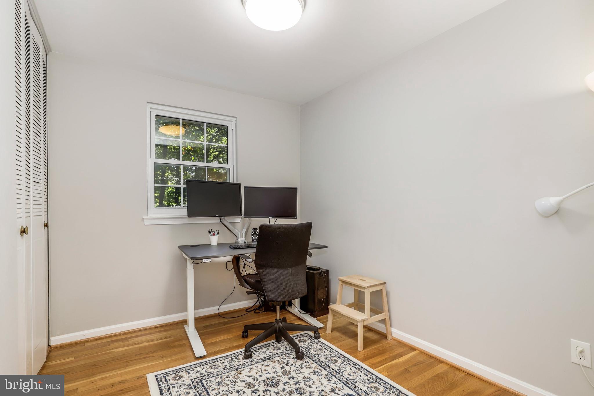 8461 Thames Street Springfield, VA 22151 - Photo 39 of 57 a workspace with furniture and a window