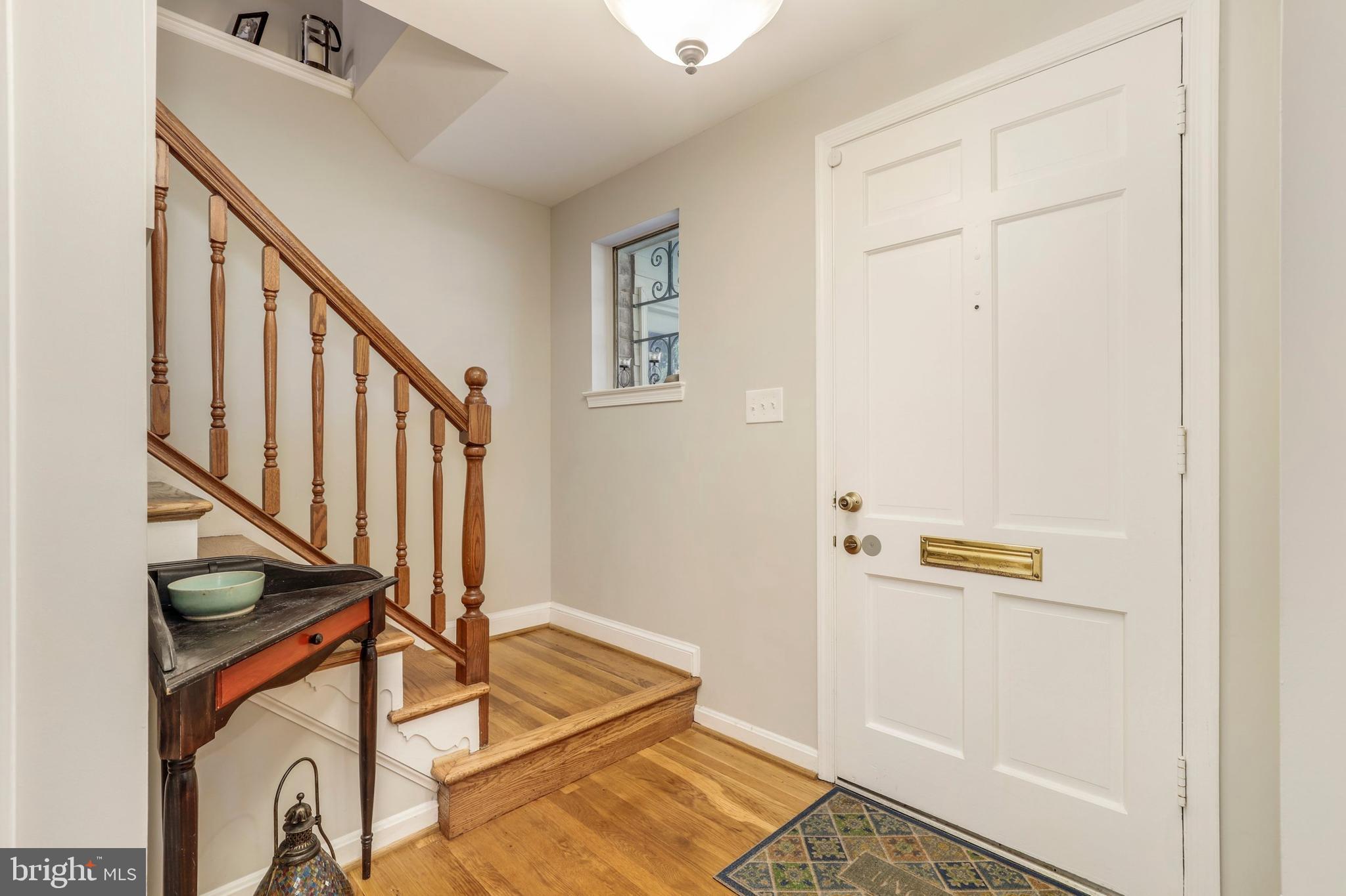 8461 Thames Street Springfield, VA 22151 - Photo 5 of 57 a view of an entryway with wooden floor