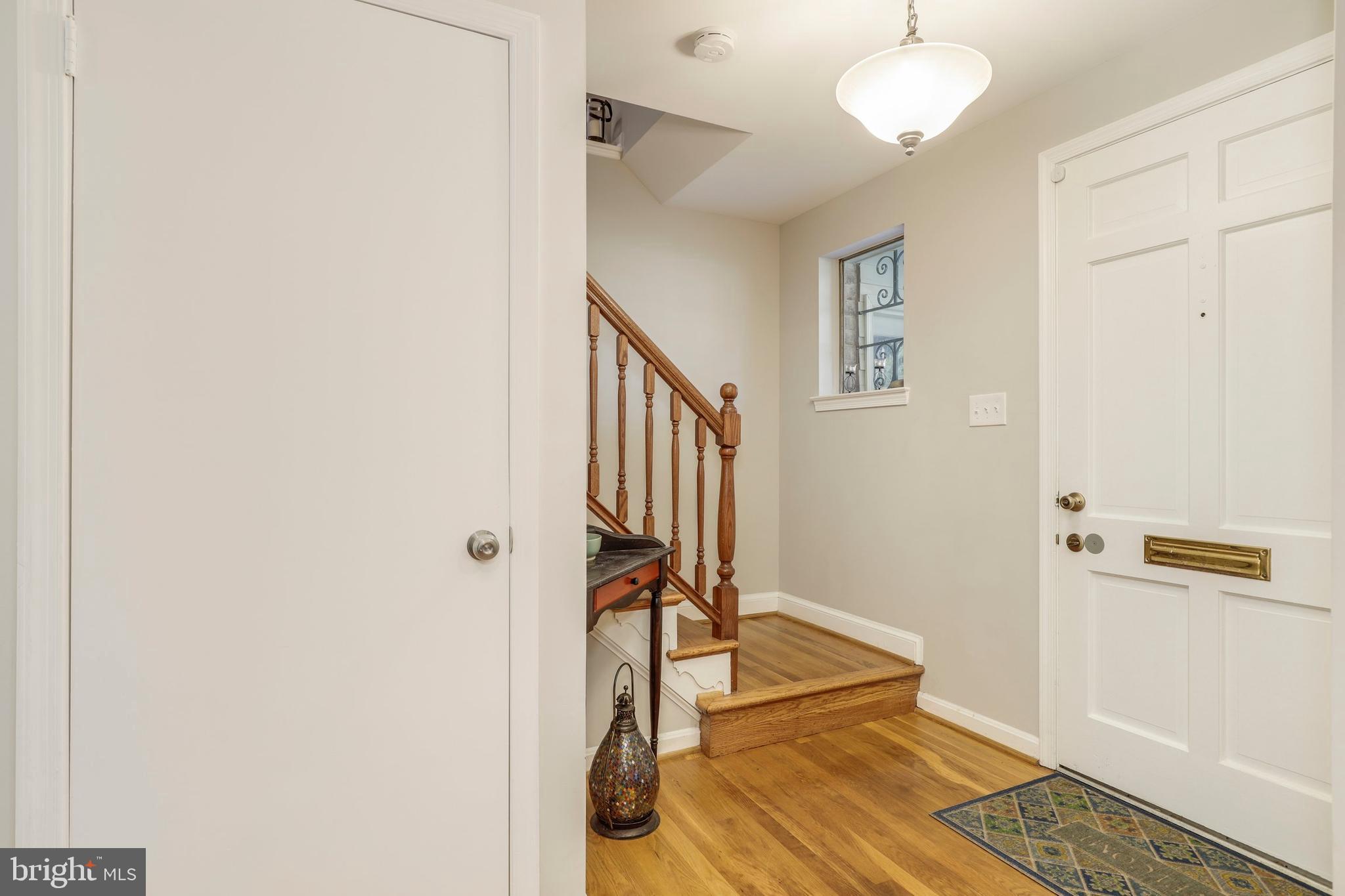 8461 Thames Street Springfield, VA 22151 - Photo 6 of 57 a view of an entryway with wooden floor