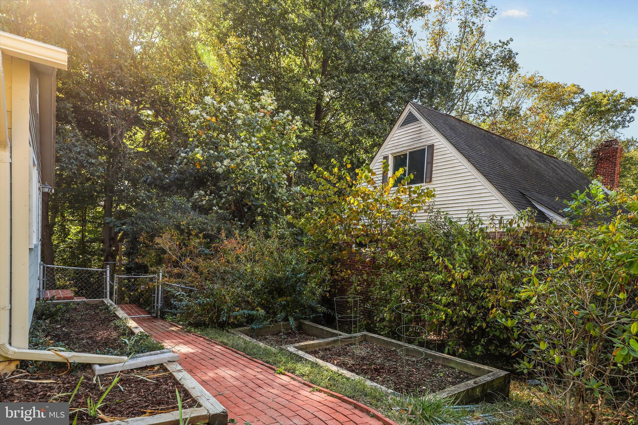 8461 Thames Street Springfield, VA 22151 - Photo 56 of 57 a backyard of a house with lots of green space