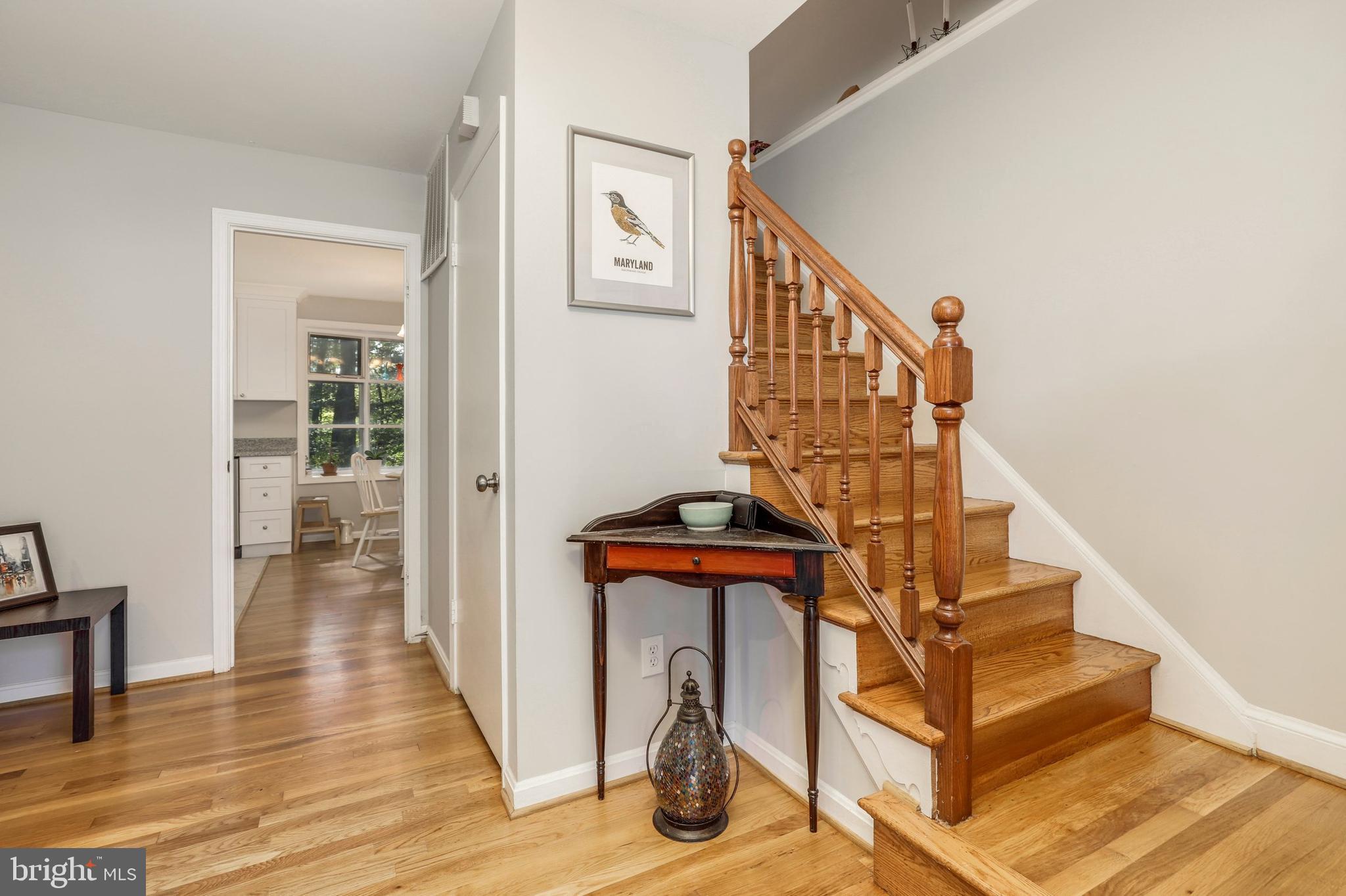 8461 Thames Street Springfield, VA 22151 - Photo 7 of 57 a view of entryway and hall with wooden floor