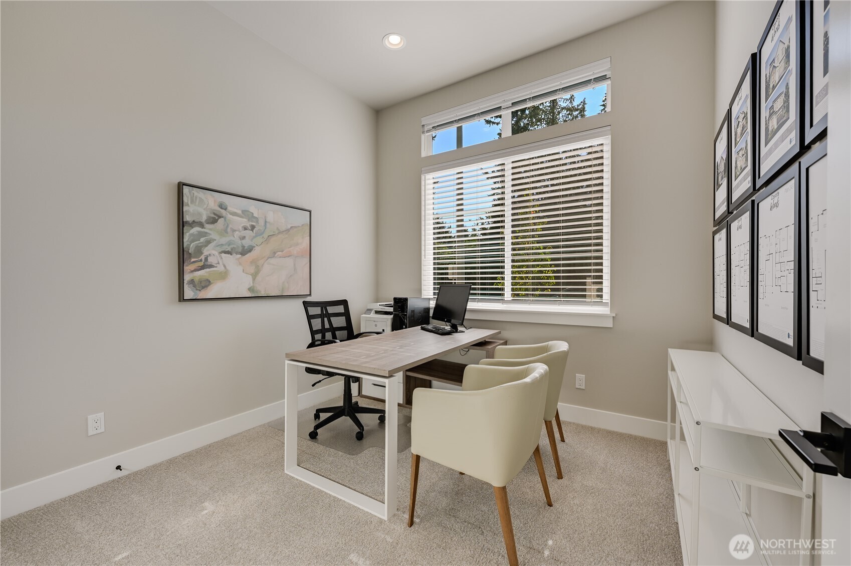 19224 Meridian Drive Southeast, Unit CW 09 Bothell, WA 98012 - Photo 3 of 37 a workspace with furniture and window