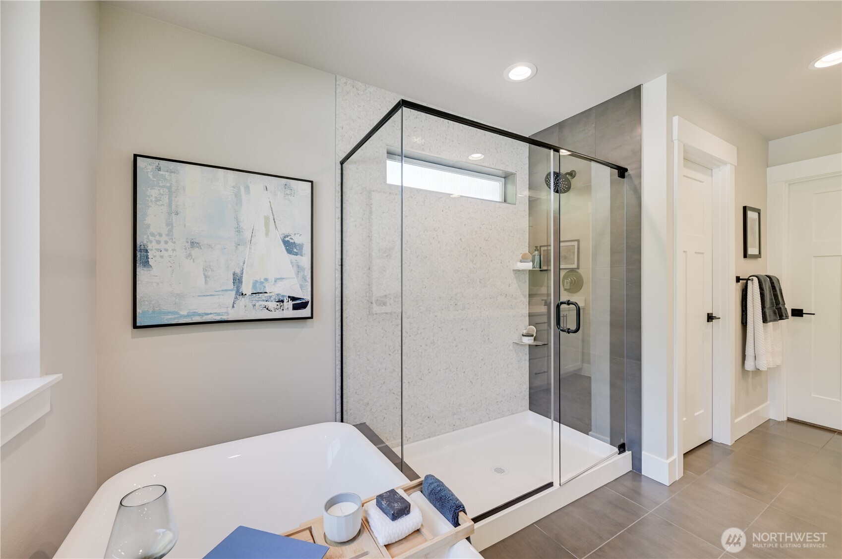 19224 Meridian Drive Southeast, Unit CW 09 Bothell, WA 98012 - Photo 32 of 37 a bathroom with a shower and toilet