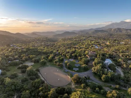 an aerial view of residential house and outdoor space