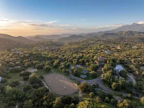 an aerial view of residential house and outdoor space