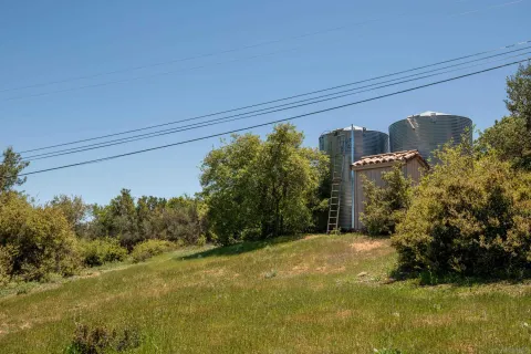 a view of a back yard of the house