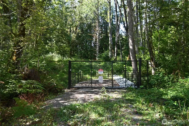 a view of chair and table in the garden