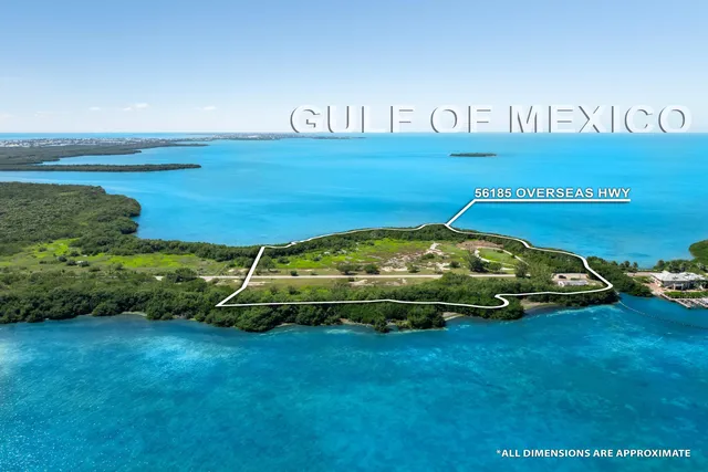 a view of a lake with big yard