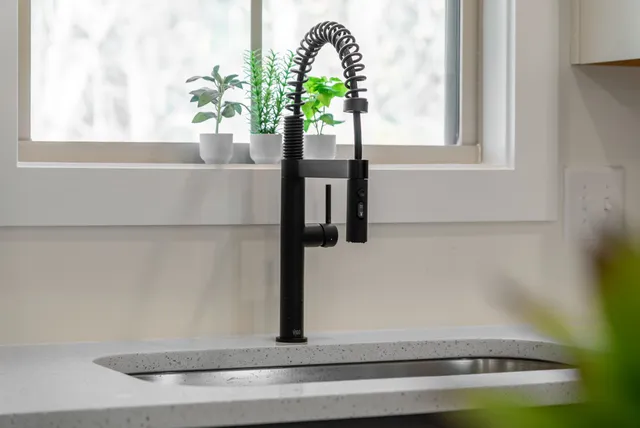 a vase of flowers sitting on a table