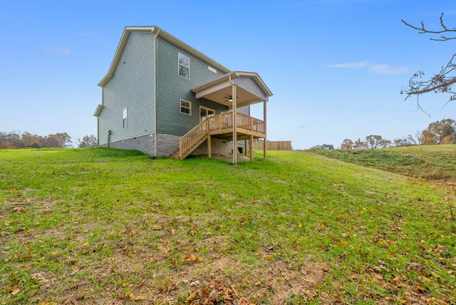 a view of a livingroom with a staircase