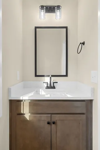 a picture of a kitchen with a refrigerator and a stove