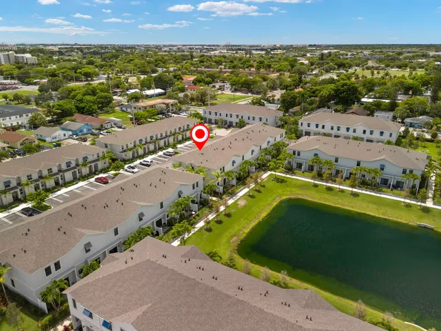 a front view of building with yard