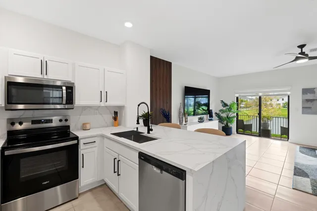 a view of a living room and dining room