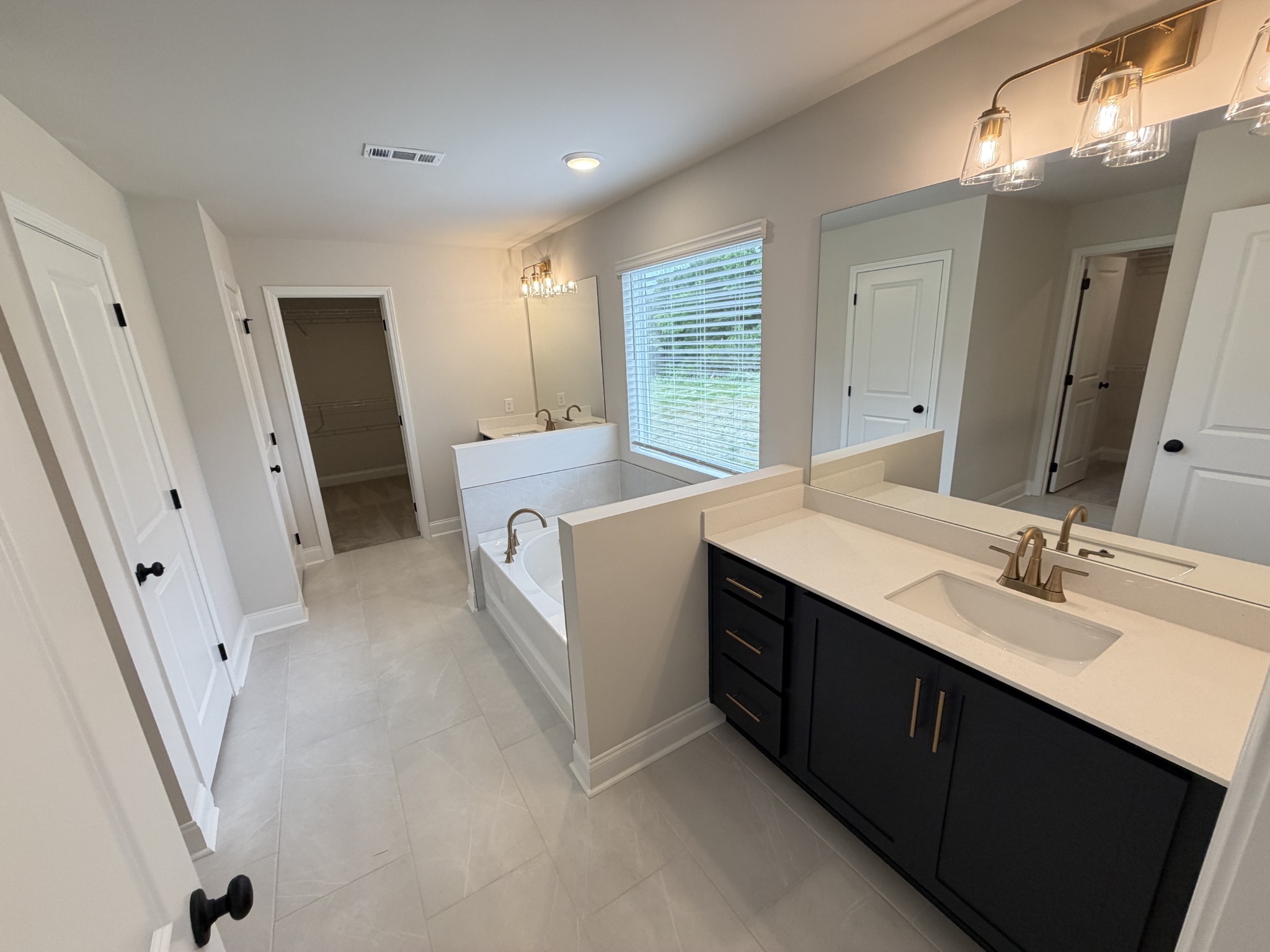 147 Emeline Way Mount Juliet, TN 37122 - Photo 35 of 41 a view of bathroom with dual sinks