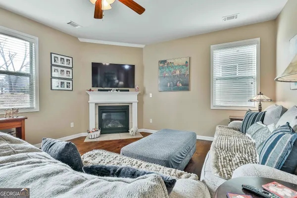 a bedroom with a bed and a fireplace