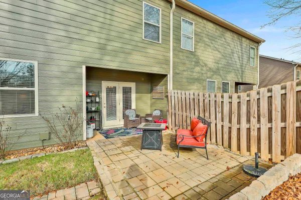 a backyard of a house with seating space