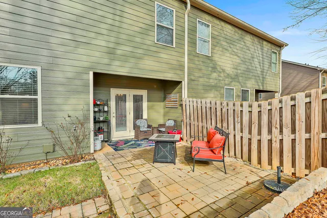 a backyard of a house with seating space