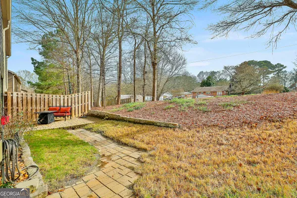 a backyard of a house with lots of green space