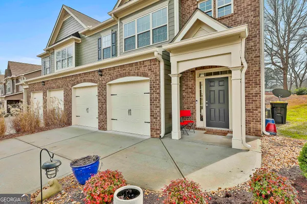 a front view of a house with an outdoor space