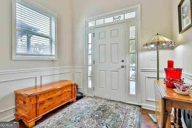 a blue room with furniture and a window