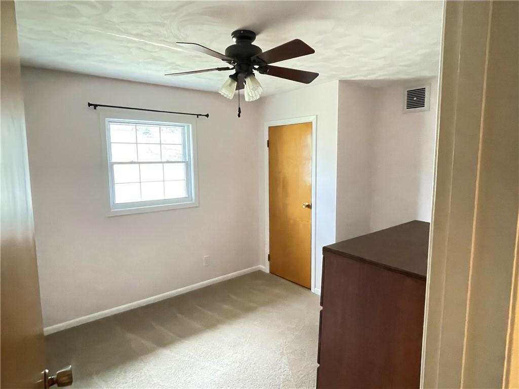 3034 Warren Road Indiana, PA 15701 - Photo 12 of 25 a view of room with a ceiling fan and a window