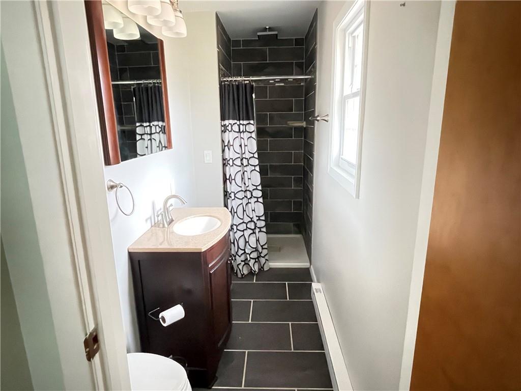 3034 Warren Road Indiana, PA 15701 - Photo 18 of 25 a bathroom with a sink toilet and shower