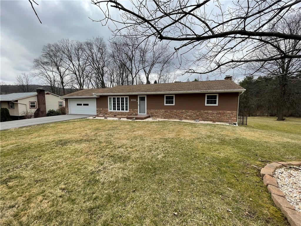 3034 Warren Road Indiana, PA 15701 - Photo 3 of 25 a front view of house with yard and seating area