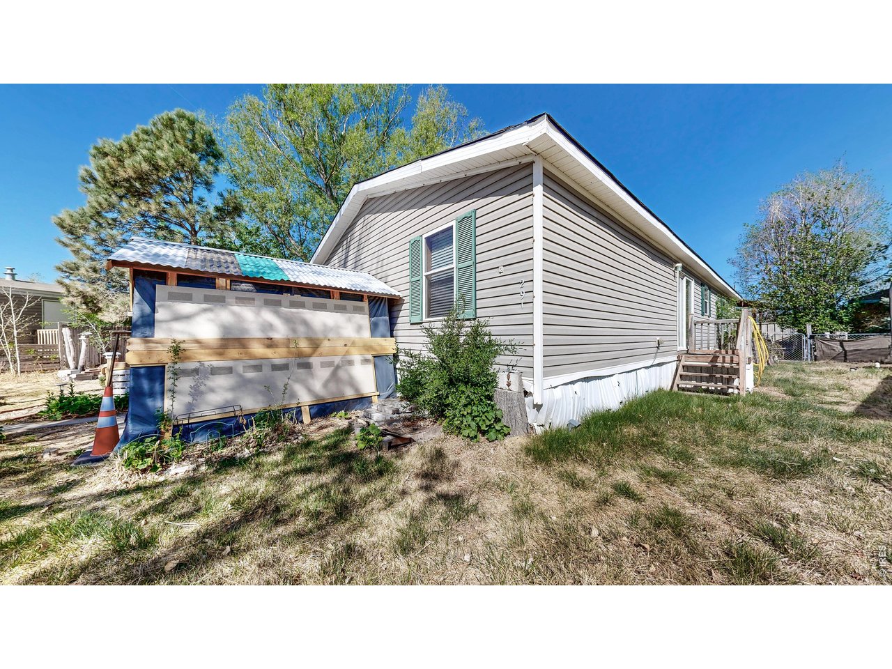 401 North Timberline Road, Unit 291 Fort Collins, CO 80524 - Photo 33 of 36 East side of home