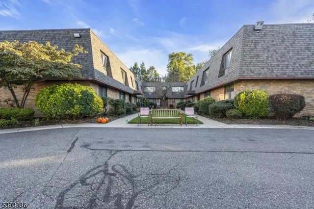 a view of brick house with outdoor space