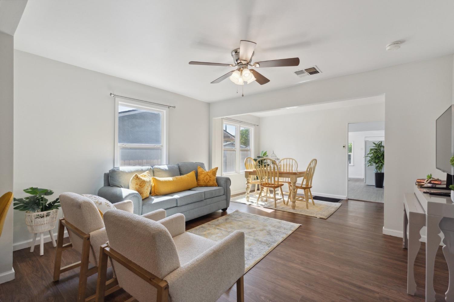 220 Sunnyside Avenue Clovis, CA 93612 - Photo 9 of 38 a living room with furniture and a large window